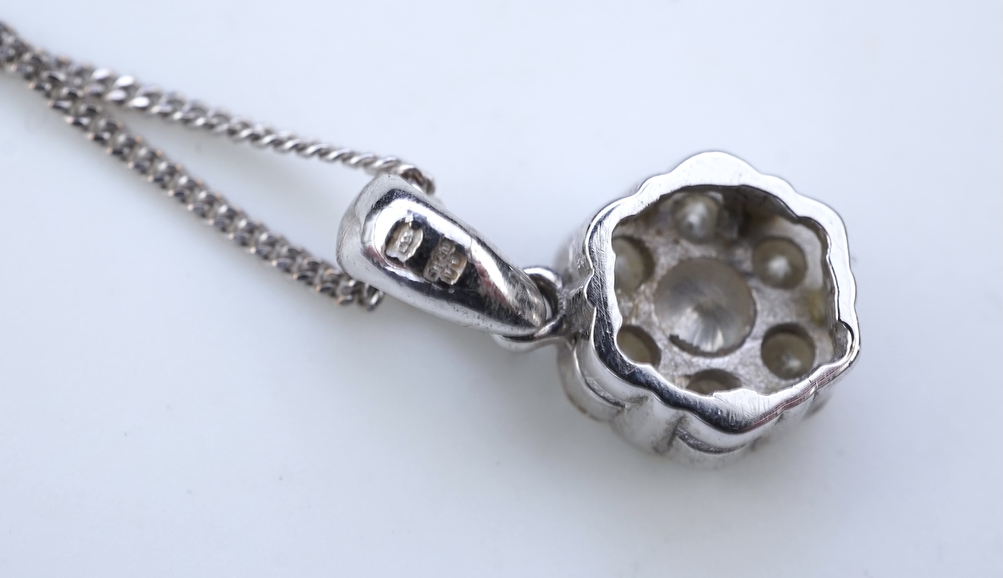 A diamond pendant necklace